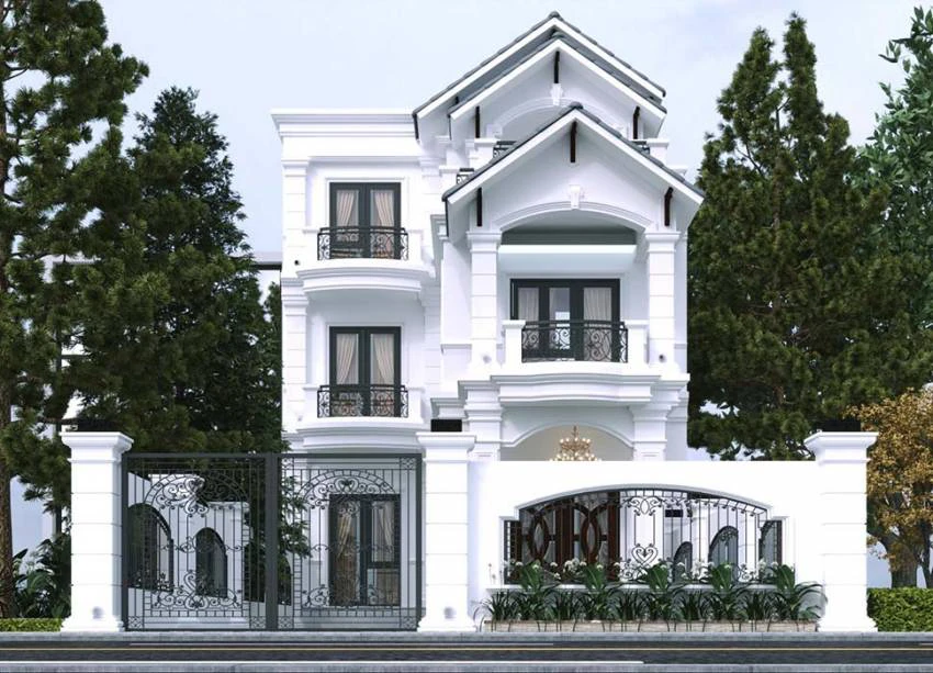 Biệt thự 3 tầng tông trắng với mái dốc, ban công sắt hoa văn đen nổi bật.